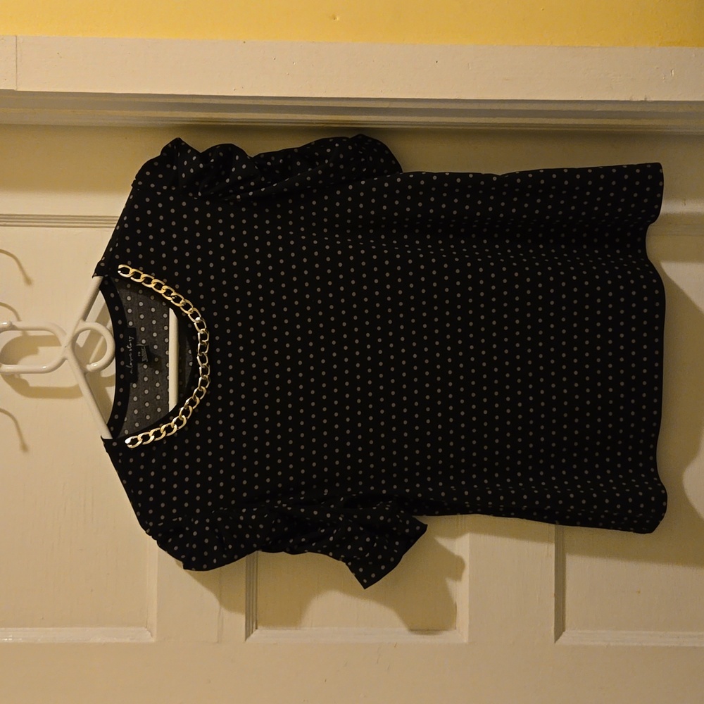 Black polka dot blouse